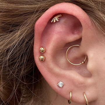 lobe, cartilage, and daith ear piercings done at the Grand Rapids MI IRIS Piercing Studio