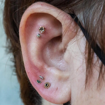 double flat stack earlobe ear piercing done at IRIS studio in Portland Oregon