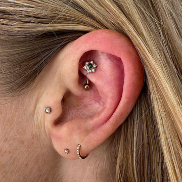 ear with a rook and two earlobe piercings done at IRIS Portland Oregon