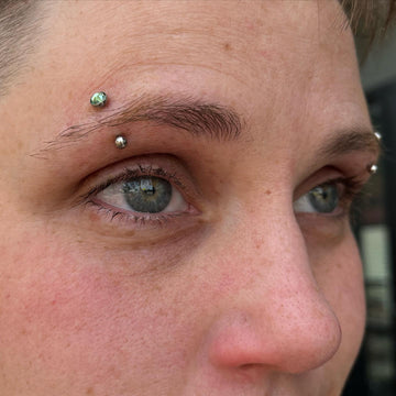 eyebrow face piercings done at the Grand Rapids MI IRIS Piercing Studio