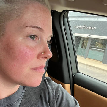 side profile of a person with a nostril body piercing they got at the IRIS Boulder Colorado location