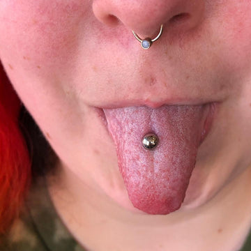 tongue piercing completed at the Grand Rapids MI IRIS Piercing Studio