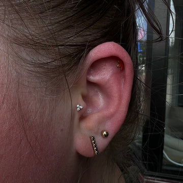 tragus ear piercing completed at the Grand Rapids MI IRIS Piercing Studio