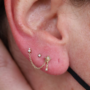 triple lobe ear piercing done by IRIS Portland Oregon